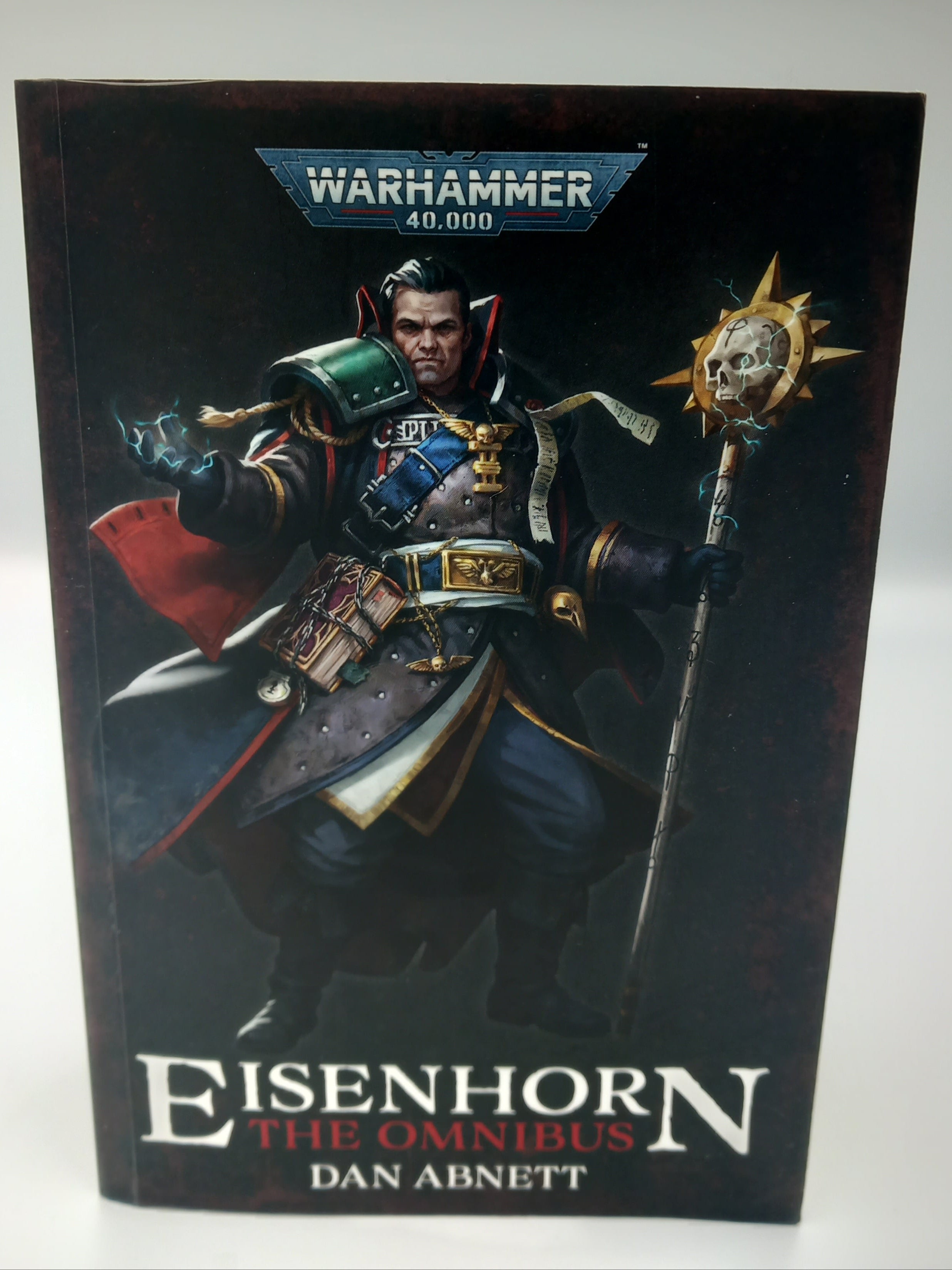 Book cover of 'Eisenhorn' by Dan Abnett with Warhammer logo on a white background